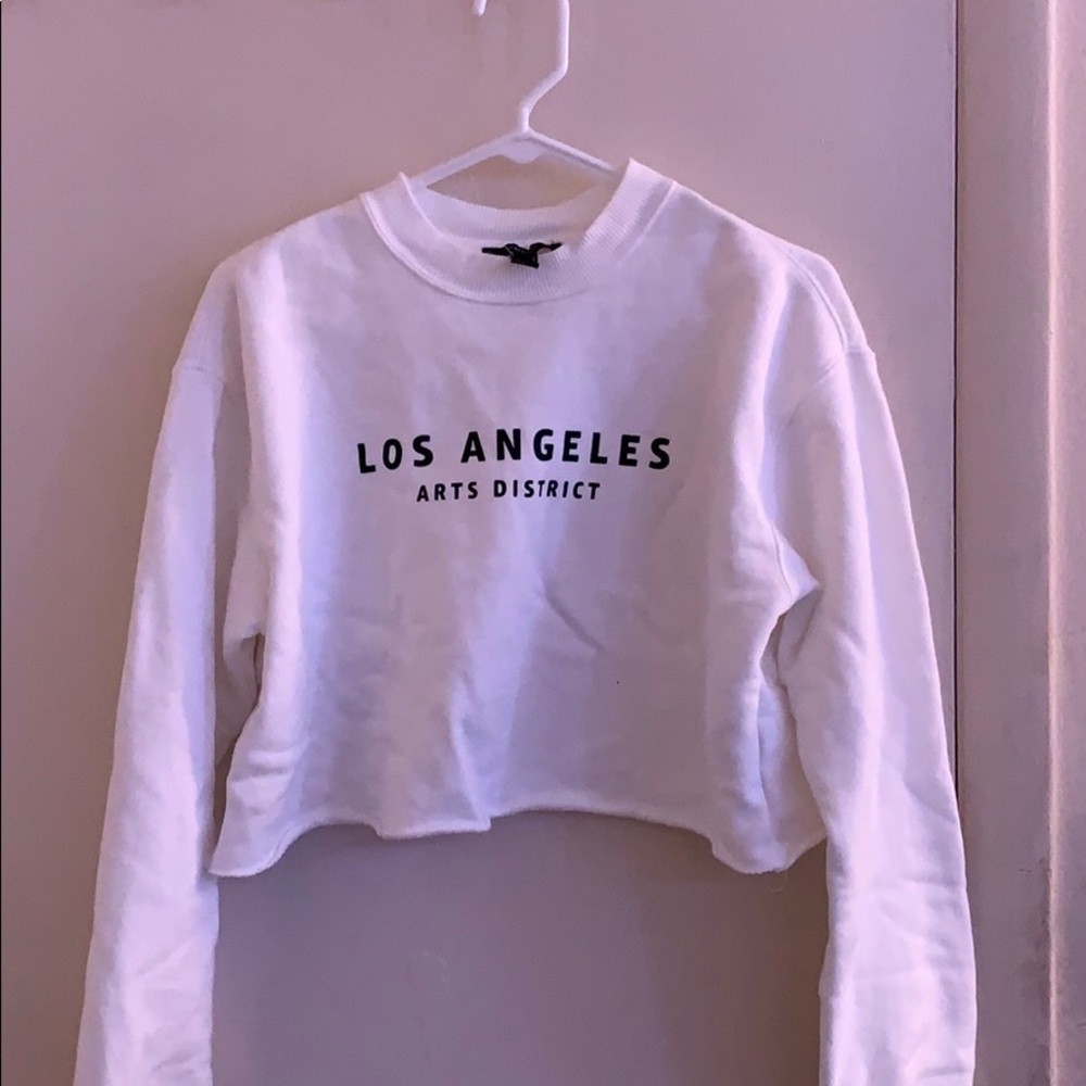 A long sleeve cropped Los Angeles graphic tee.